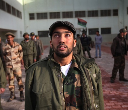 Лівійські повстанці в особах
