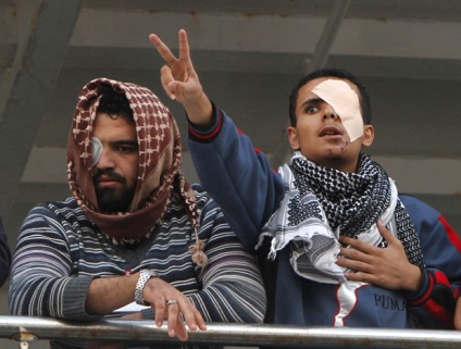 Лівійські повстанці в особах