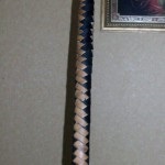 Weaving ostor a kezében, ostor (a szövés ostor) Weaving ostor a kezében, ostor