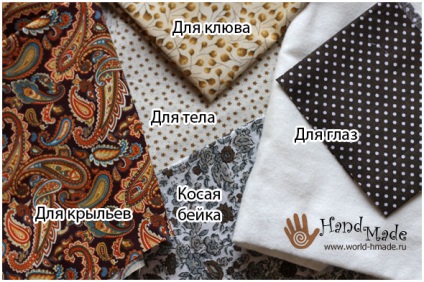 Potholder „bagoly” saját kezével (a fej tetején) Potholder „bagoly” saját kezűleg