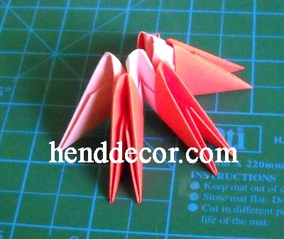 Ceruza csésze kezével moduláris origami papír