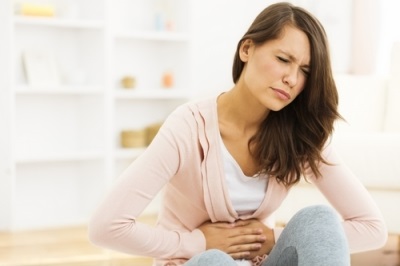 Miért húzza (fájdalom, bizsergés, fájdalom) has az ovuláció után a menstruáció előtt