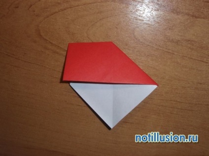 Papírból készült cikkek kezeddel origami gomba