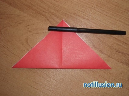Papírból készült cikkek kezeddel origami gomba