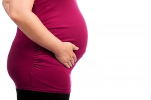 Причини поколювання матки при вагітності і перед місячними