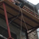 Javítása a felső emeleti (padló) erkély tető Javítása a tető az utolsó emeleten erkély