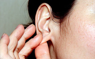 Miért fáj a fülcimpa - az ok és mi a teendő
