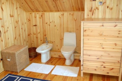 Hogyan, hogy a fürdőszoba egy fából készült ház