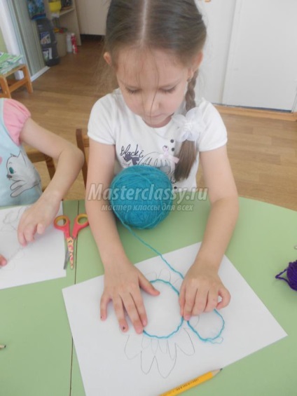 Ábrákon fonalból (kép) Ábrákon fonalból