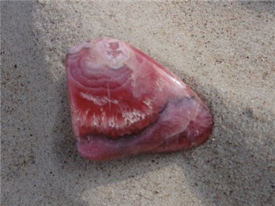 Kő Rodokrozit mágikus tulajdonságait az állatöv jel, fotó