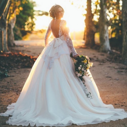 Елегантні весільні сукні з відкритою спиною - вибір за всіма правилами