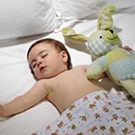 Miért a gyermek megmozdul álmában, az egészségre