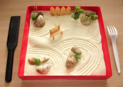Táblázat japán kert homok és kövek a kezüket