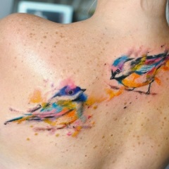 Tetoválás a lapocka, férfi és női tetoválás fotó
