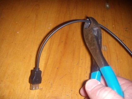 USB töltő szivargyújtóhoz kezéről