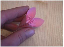 Origami kézműves az új évben a kezüket a fotó és videó mikron