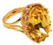 Kő sárga topáz, sárga topáz tulajdonságok, fotó arany topáz (fényképet golden topaz) Sárga topáz kő, a tulajdonságait arany topáz, sárga topáz fotó