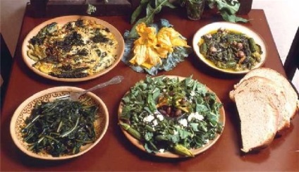 A hagyományos konyha Kréta mezedes, Kleftiko, mizithra, stamnagati, loukanika, Dakos Khokhlov és tsikoudia