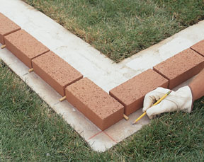 Construire un mur de briques de jardin - Extreme Comment