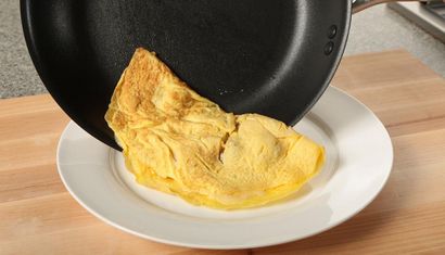 La cuisson du Omelette Parfait (d'une cuisine) La cuisson du Omelette Parfait