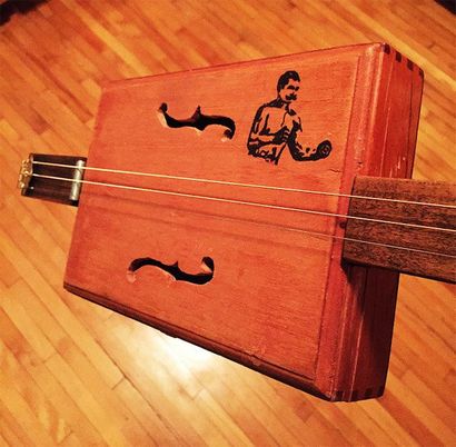 Bricolage Cigar Box Guitar, The Art of Virilité