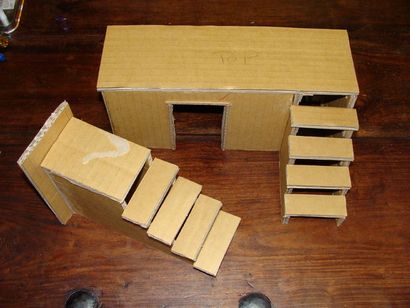 Puppenhaus von den Kästen und Karton 5 Schritten