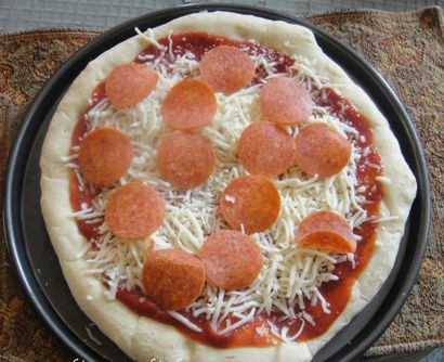 Wie Selbst gemachte gefrorene Pizza machen - Organisieren Sie sich dünne