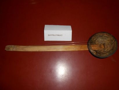 Einfaches Musik-Instrument Mit Coconut Shell und Bambus-Stock