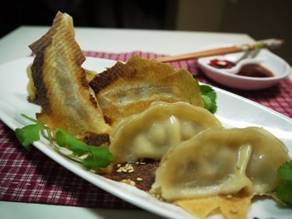 Drehen Gefrorene Dumplings in GOLDEN CRISPY Potenziometeraufkleber