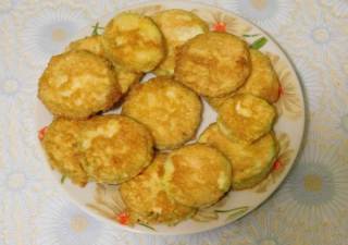 Fried cukkini fokhagymás, paradicsom és a sajt - a recept egy fotó