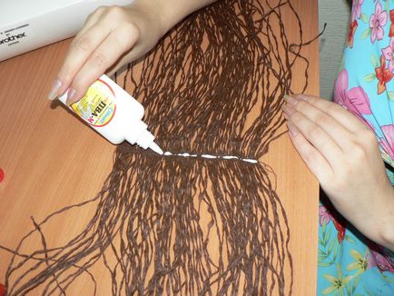 Hogyan kell varrni a haj textil baba