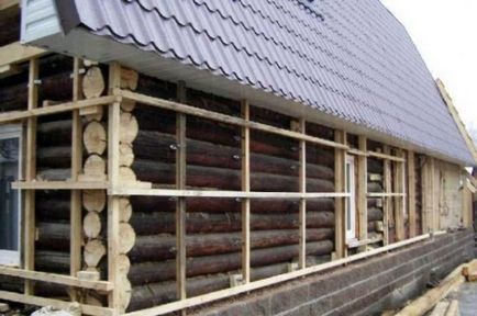 Falszigetelés téglából és fából készült ház külső
