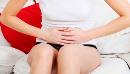 A hasi fájdalom a menstruáció előtt okait és lehetséges lokalizáció a fájdalom