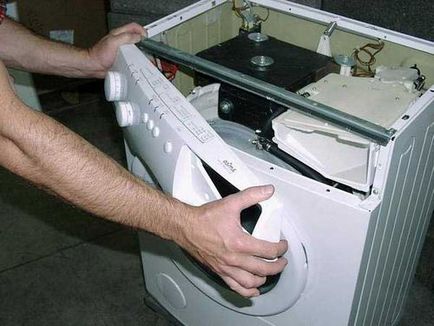 Hogyan szedjük szét a mosógép Indesit függőleges terhelés a saját kezét