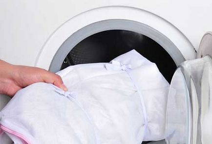 Hogyan mossa fehér tüll volt a mosógépben otthon