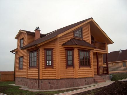 Burkolóanyagok fa ház homlokzata