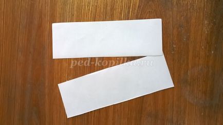Hare papírcsíkot a kezével (sáv) Hare papírcsíkot a kezével