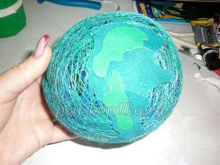 Globe kezével (Globe) Globe kezével