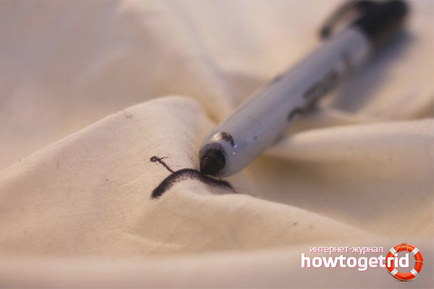 Как да изпере дрехите, с бяла писалка