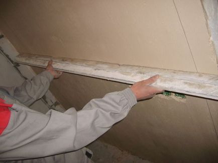 Изравняване мазилка стени с помощта на шпатула със своя ръце фото и видео инструкция