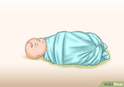 Как да се държи бебето в ръцете си
