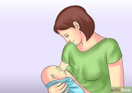 Как да се държи бебето в ръцете си
