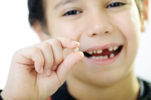 Премахване на млечните зъби при деца