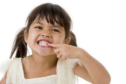 Дете шлайфане зъбите си в съня си - Причини, решения на проблеми