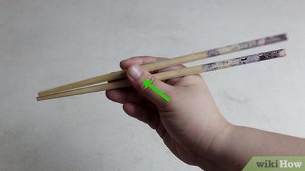 Как да се държат пръчици за хранене