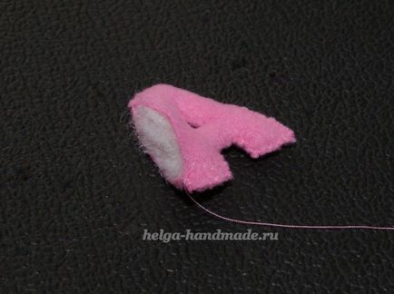 Puha ábécé betűi és számok a szövet a kezével (szövet) Puha ábécé betűi és számok a szövet meg a kezét