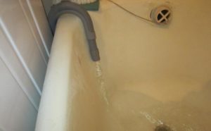 Cum să conectați furtunul de evacuare al mașinii de spălat la canalizare