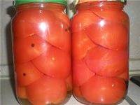 Домашній кулінар - помідори часточками на зиму з часником