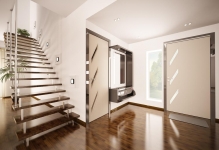 Sala de intrare cu scări de fotografie la coridorul de la etajul 2 din cușcă și dulapuri, design interior într-o casă privată