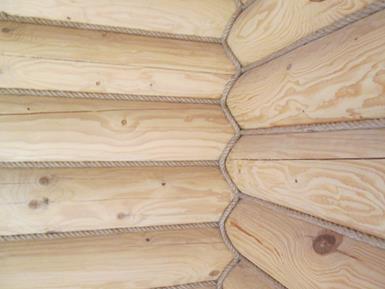 Технологія обробки зрубу дерев'яного будинку джутовим канатом